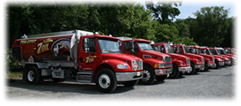 A fleet of 7 Oil heating oil delivery trucks in New Jersey